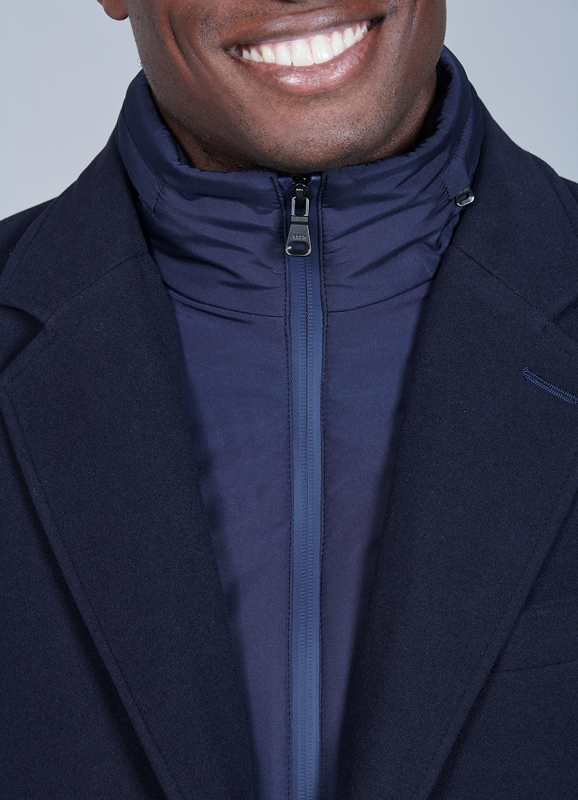 Coat with removable facing and tailored collar